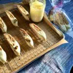 a tray of biscotti dipped in chocolate.