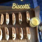 biscotti on a rack with parchment paper