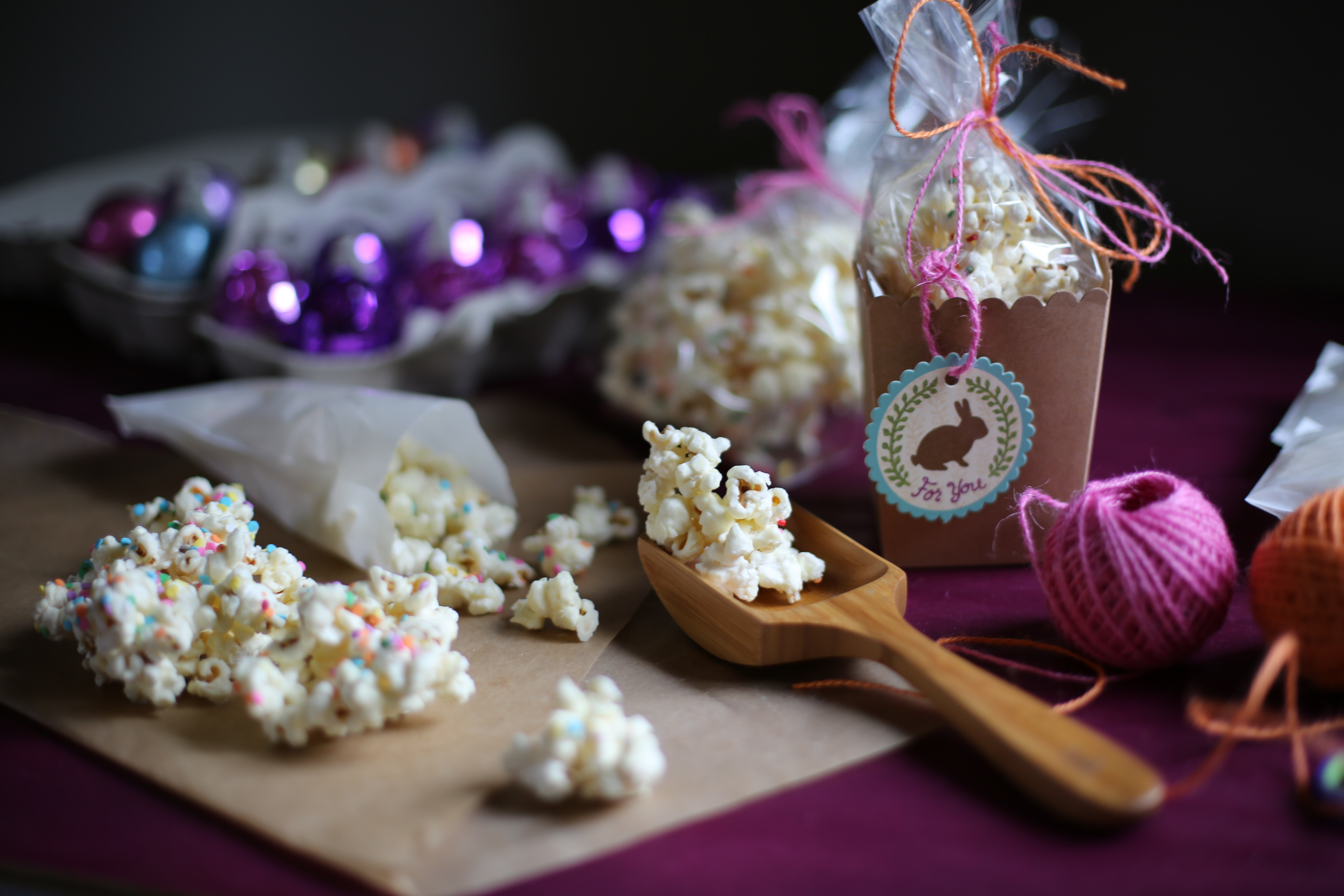 a scene of popcorn and scoop and party decorations 