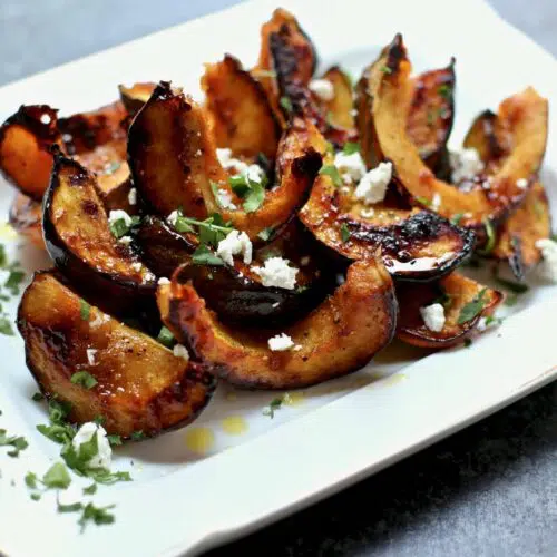 roasted squash on a white platter