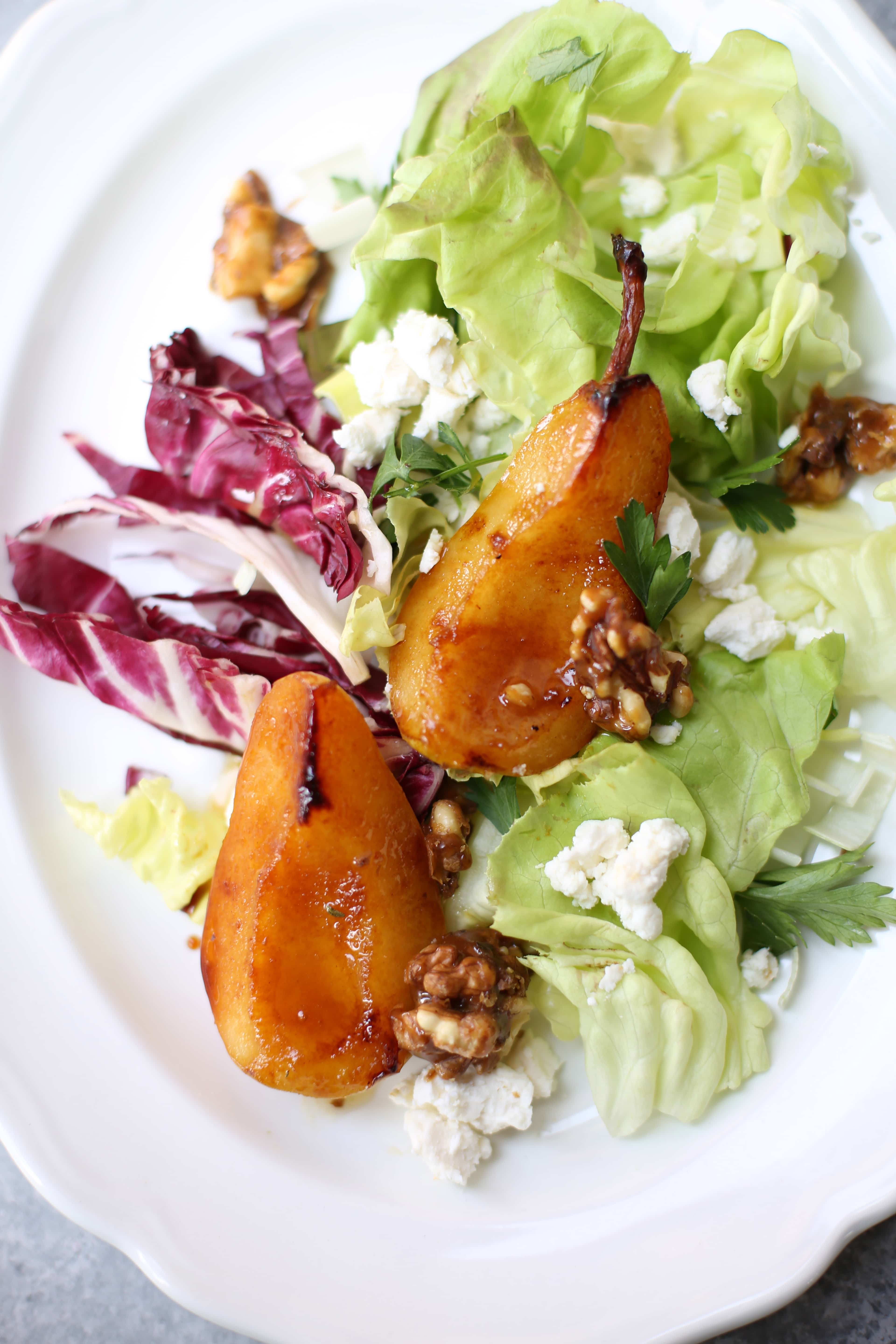 Pan Roasted Pear Salad ingredients on a white plate 