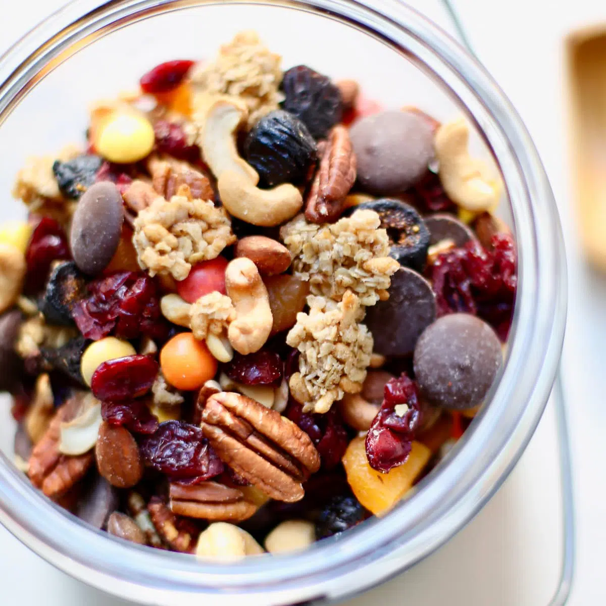 a glass bowl of trail mix.