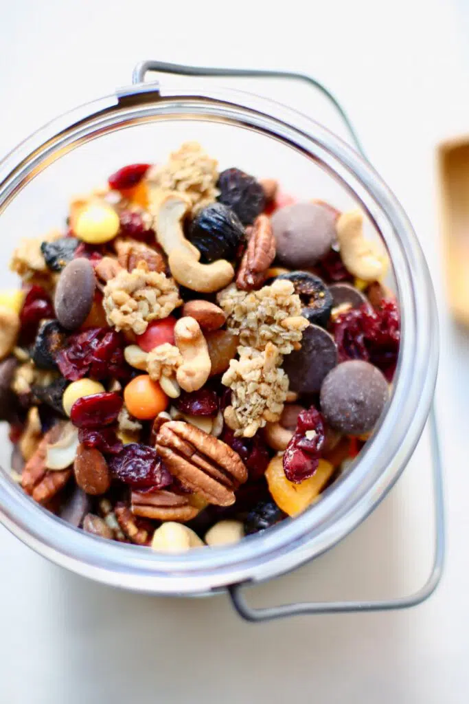 a glass bowl with homemade trail mix in it.