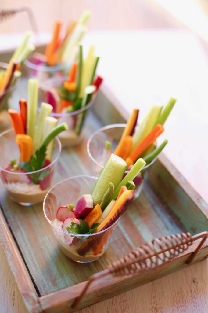 Veggie Cups with Hummus on a tray 