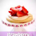 a cookie with strawberries on top with a text overlay saying the recipe name.
