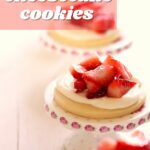 a picture of strawberry cheesecake cookies with a text overlay saying the recipe name.