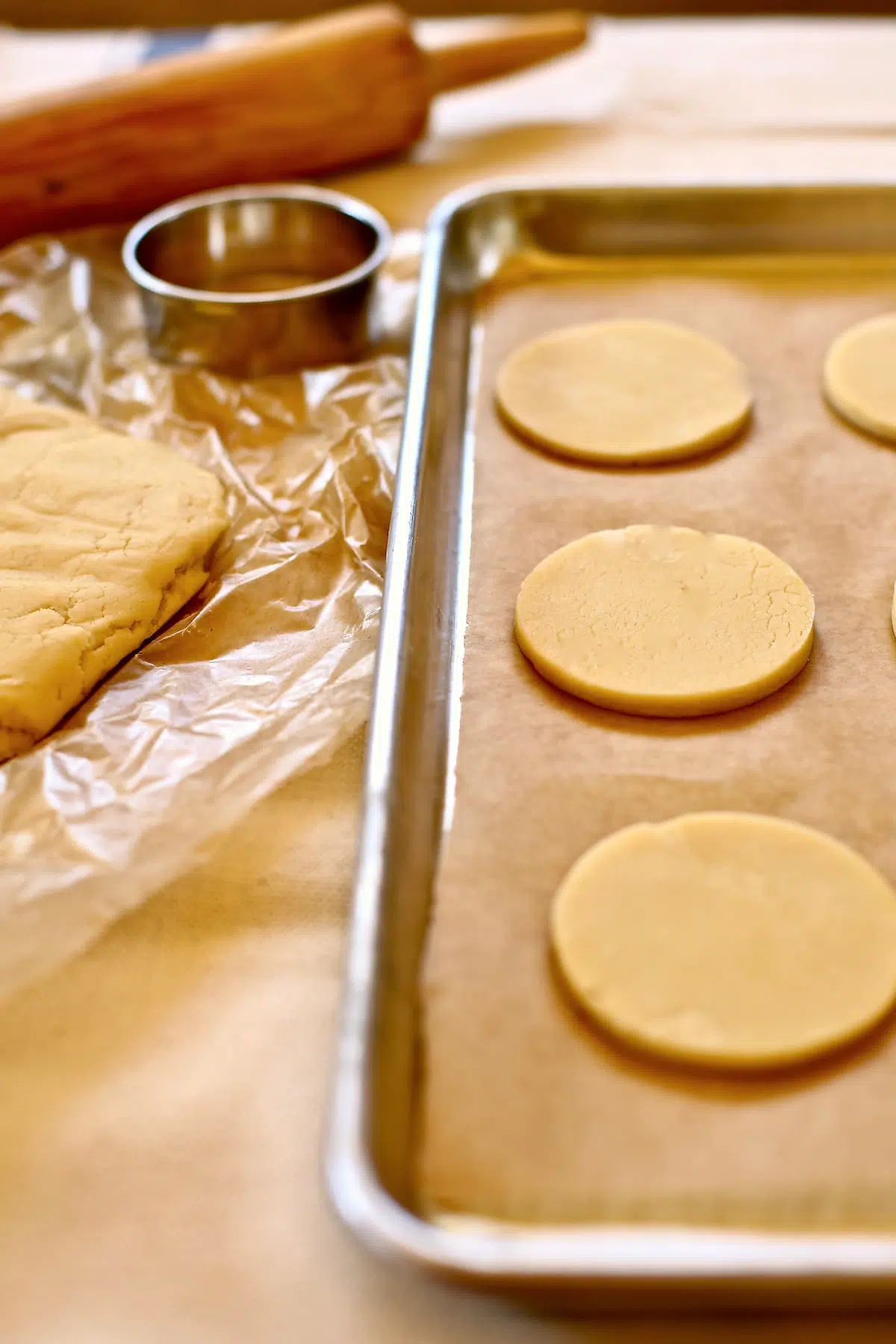 a baking tray of unbaked cookies.