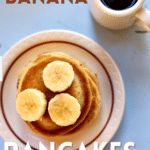 peanut butter pancakes on a blue table with syrup next to it and text overlay of the recipe name