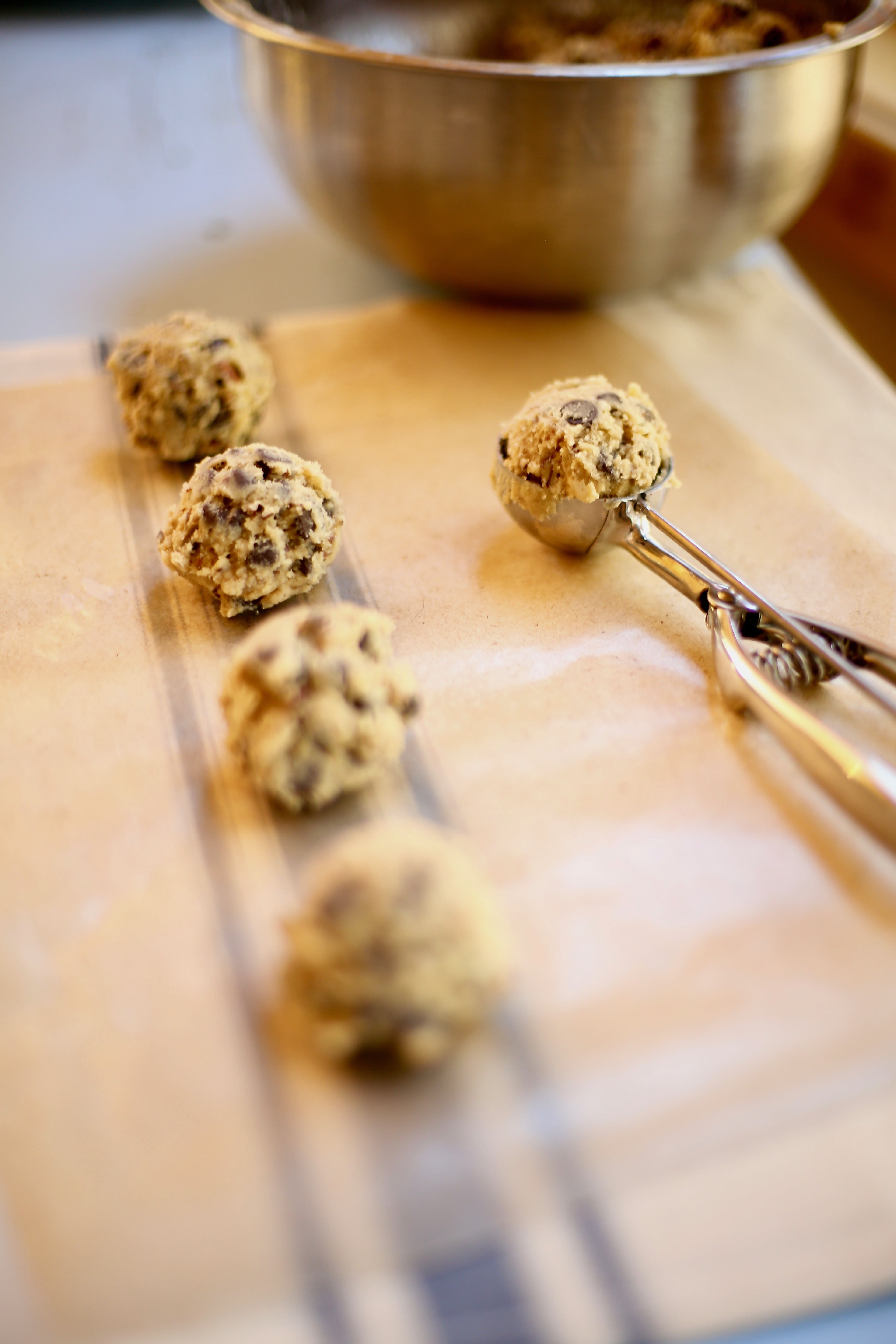 Favorite Chocolate Chip Cookie Dough by Studio Delicious.com Scooped uncooked Favorite Chocolate Chip Cookie dough