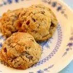 a plate of chocolate chip cookies with text overlay saying the recipe name.