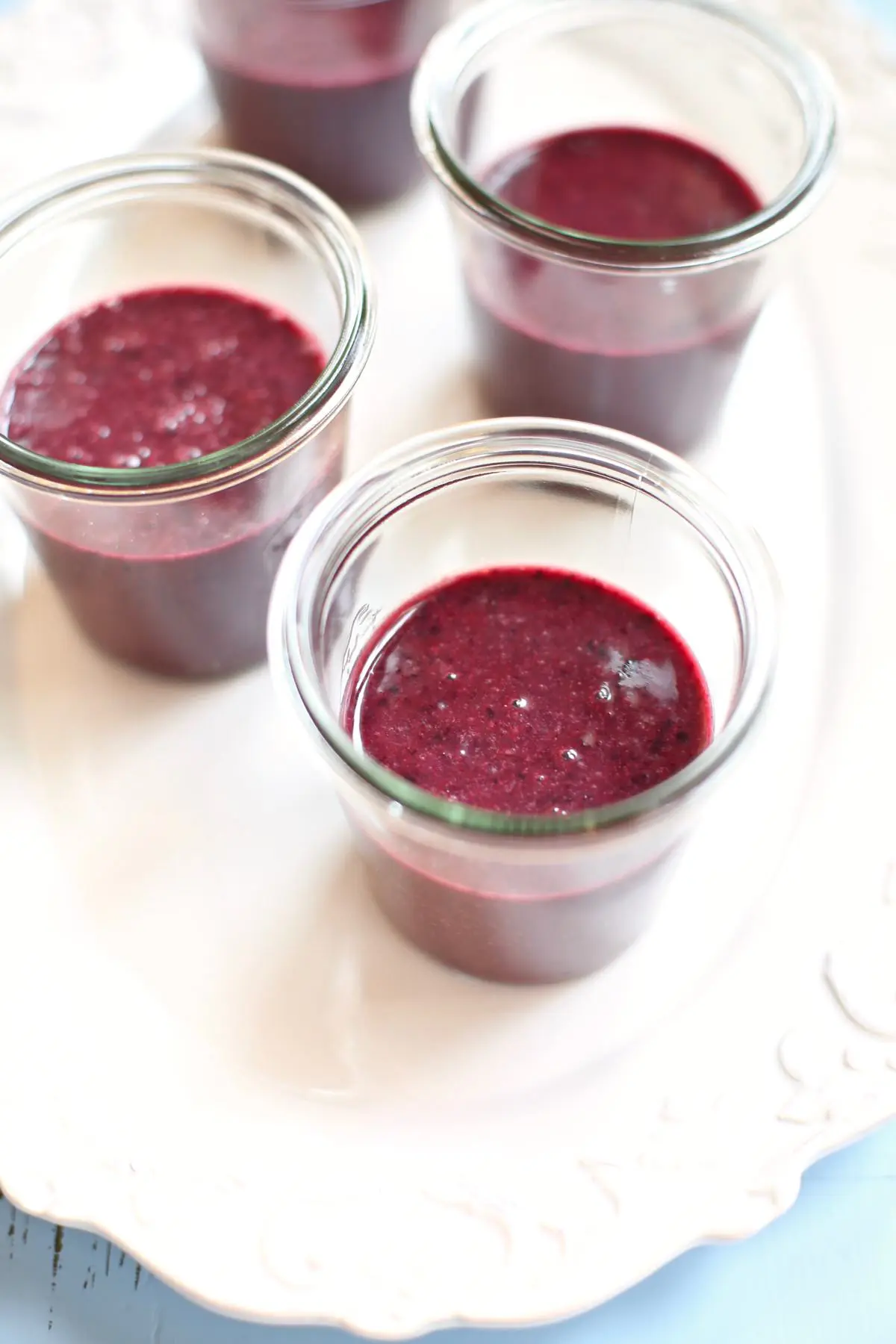 cherry smoothies on a white table