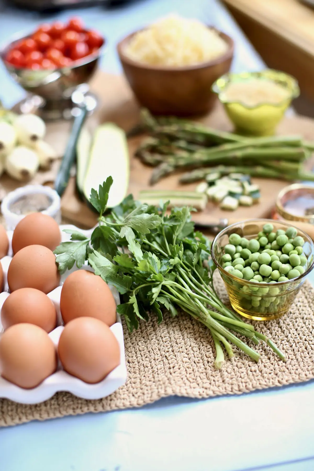 eggs and vegetables on a cutting board 