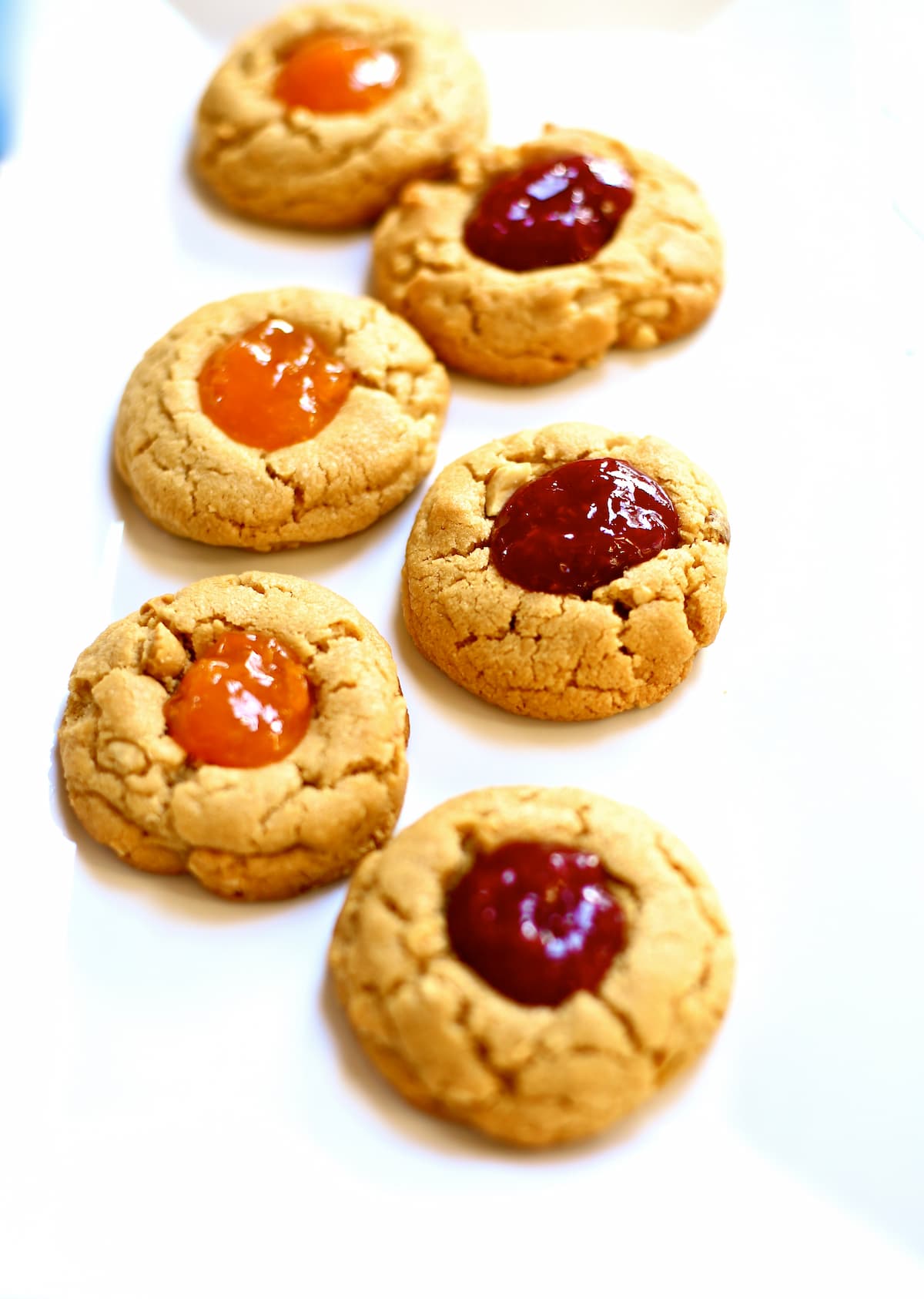 Peanut Butter and Jam Cookies a white platter of peanut butter cookies.