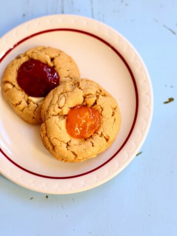 a square image of cookies on a plate.