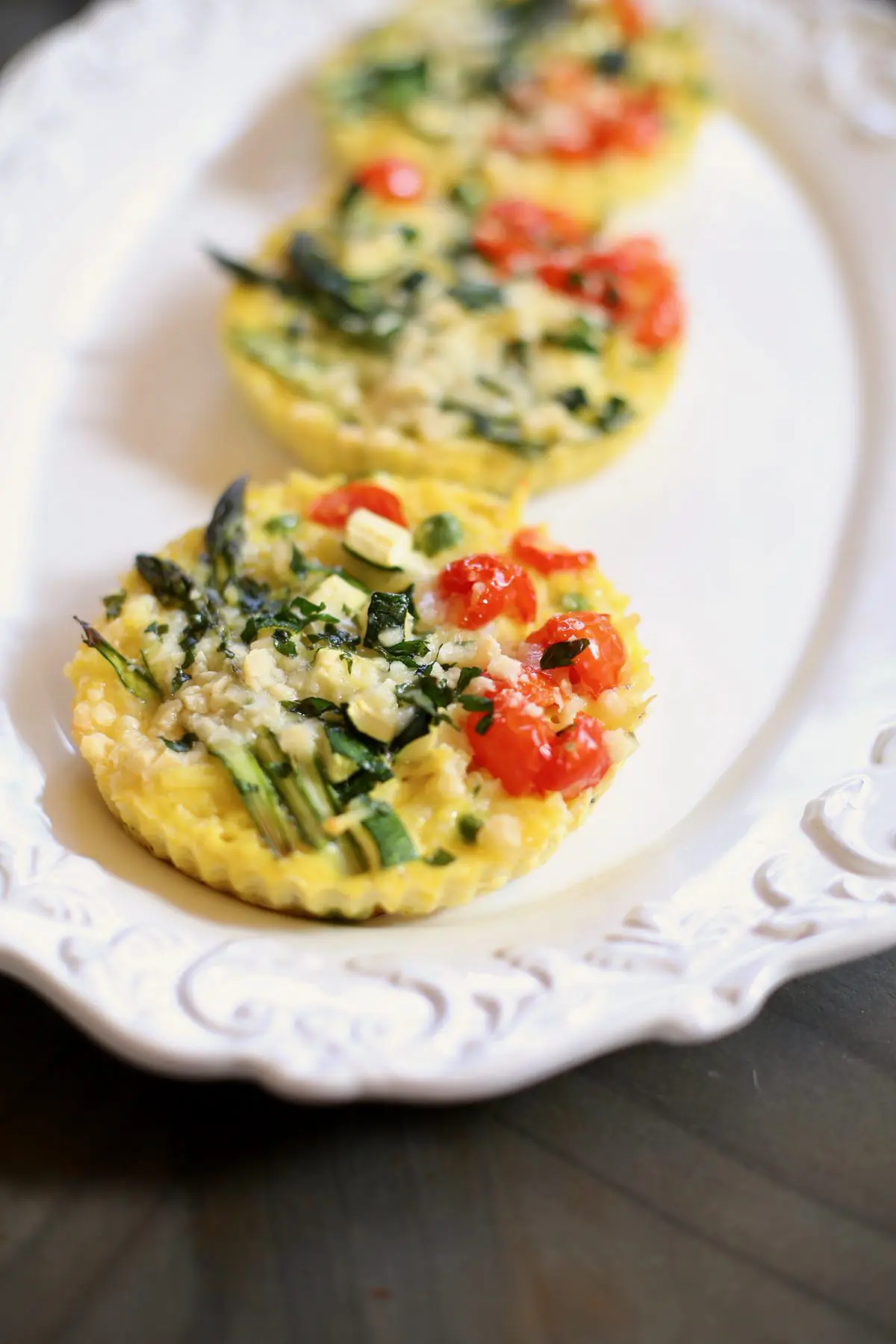 frittatas on a white platter 