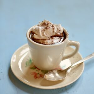 a cup and saucer of hot chocolate