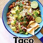 a skillet of food with a text overlay saying its a skillet taco bake.