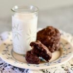 a palte of cookies and milk on a table with text overlay saying the recipe name