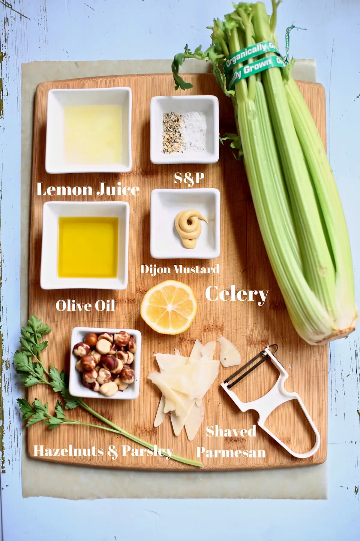 ingredients for salad on a wooden cutting board