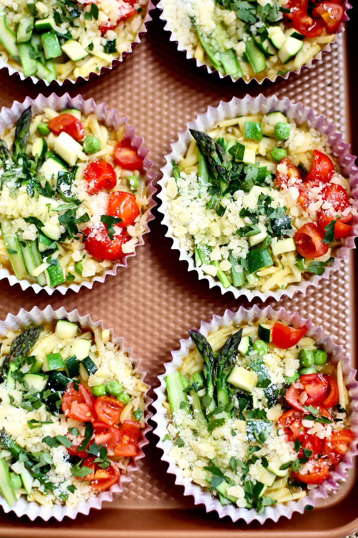 six vegetable frittata's on a copper baking sheet
