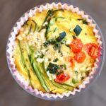 a pinterest image of a veggie frittata with text overlay.