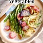 a white plate with brown trim of roasted vegetables and vinaigrette with a bron fork alongside, and text image over the top saying the recipe name.