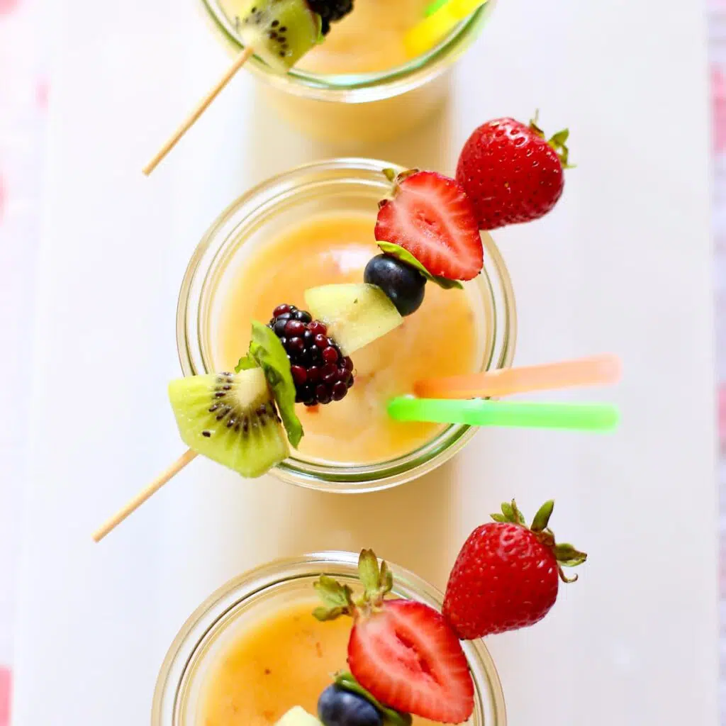 a tray of pineapple slushies.