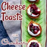 toasts with cheese and cranberry sauce on a green vertical serving plate with text overlay of the recipe name