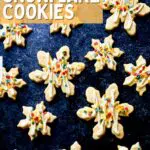 a black background makes chocolate snowflake cookies stand out. With a text overlay saying the recipe name.