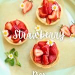 three mini strawberry pies on a serving platter with text over lay saying the recipe name