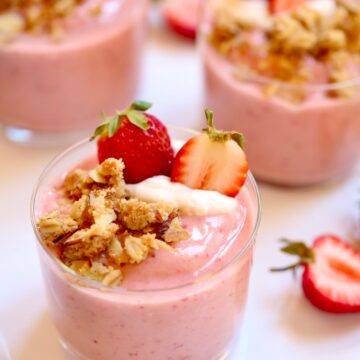 strawberry smoothies on a white tray, close up shot.