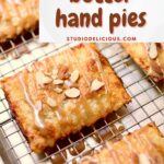 a photo of apple butter hand pies sitting on a wire rack, with the name of th recipe in a white text box.