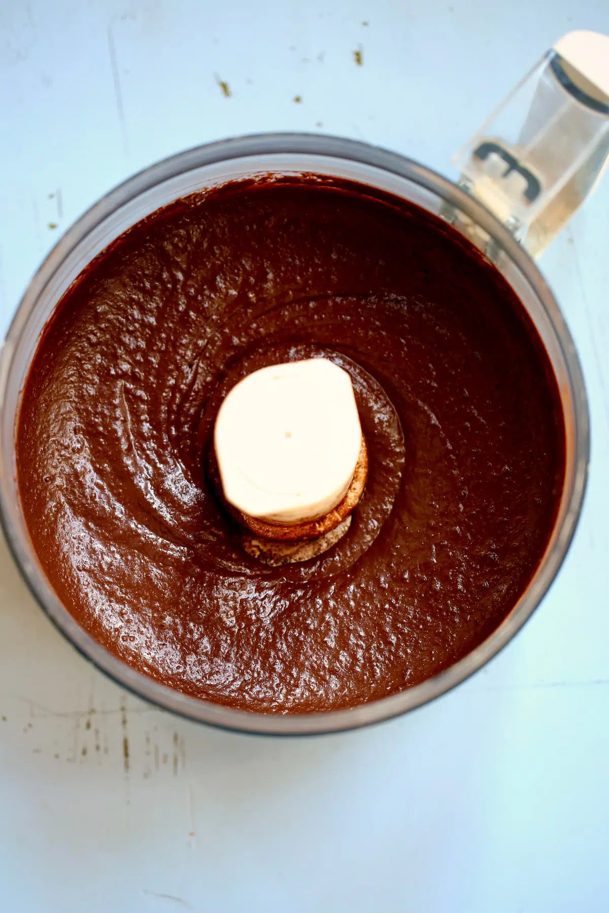 a food processor of chocolate hummus.