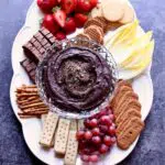 a white serving platter with dark background.