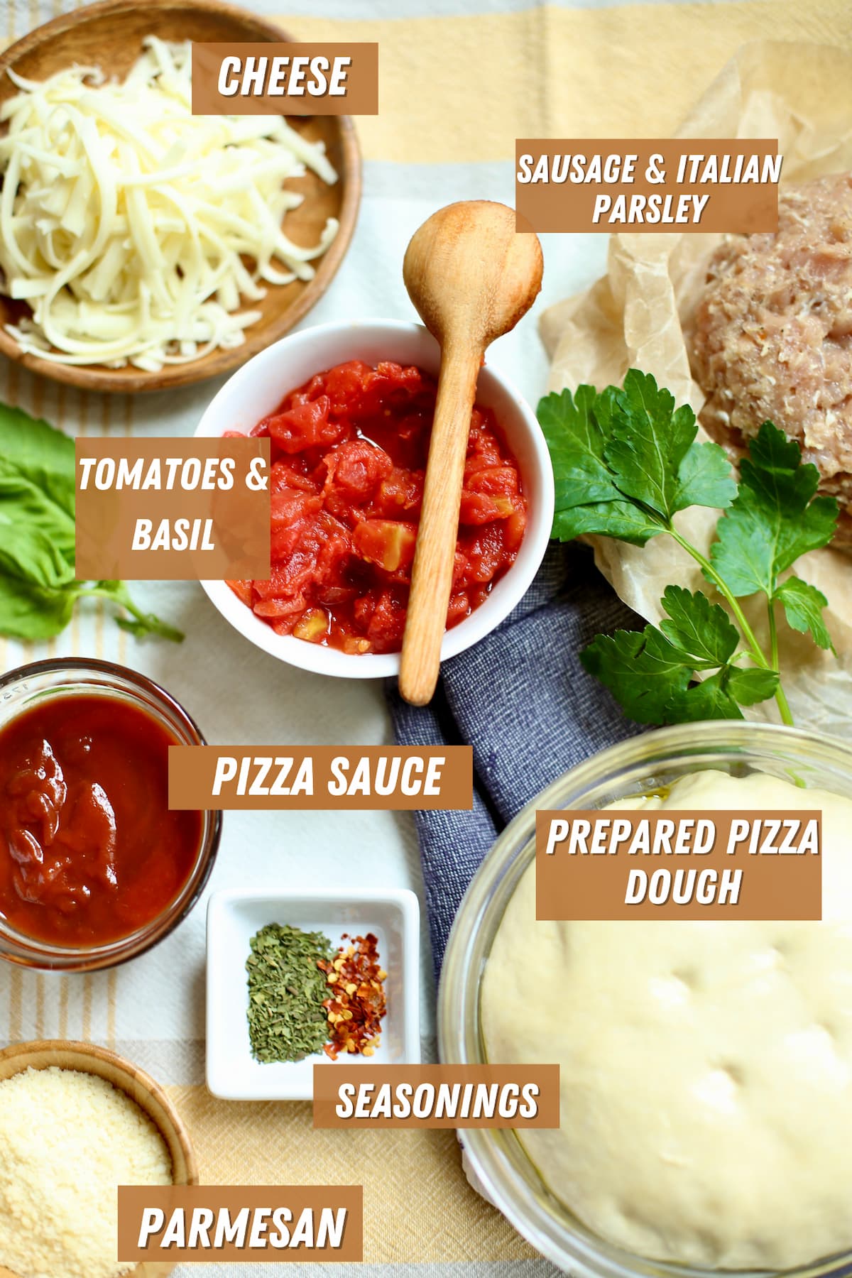 a table with ingredients for deep dish pizza.  
