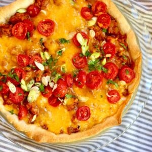 a square image of a taco pie with crescent rolls.