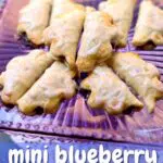 a purple glass serving tray with mini blueberry pies on it, and a texgt overlay that says the name of the recipe.