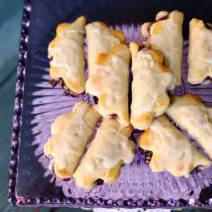 a purple platter of mini pies.