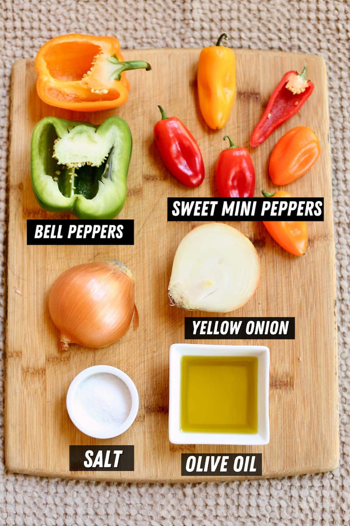a cutting board with ingredients for a recipe.