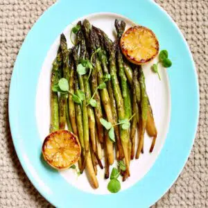 a 1200 x 1200 image of a platter of asparagus.
