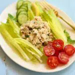 a photo of a plate of tuna salad, with text on top saying the recipe name.