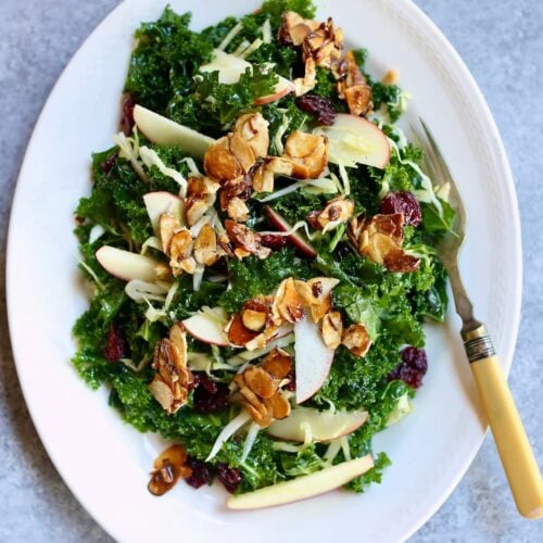 a square image of a kale salad.