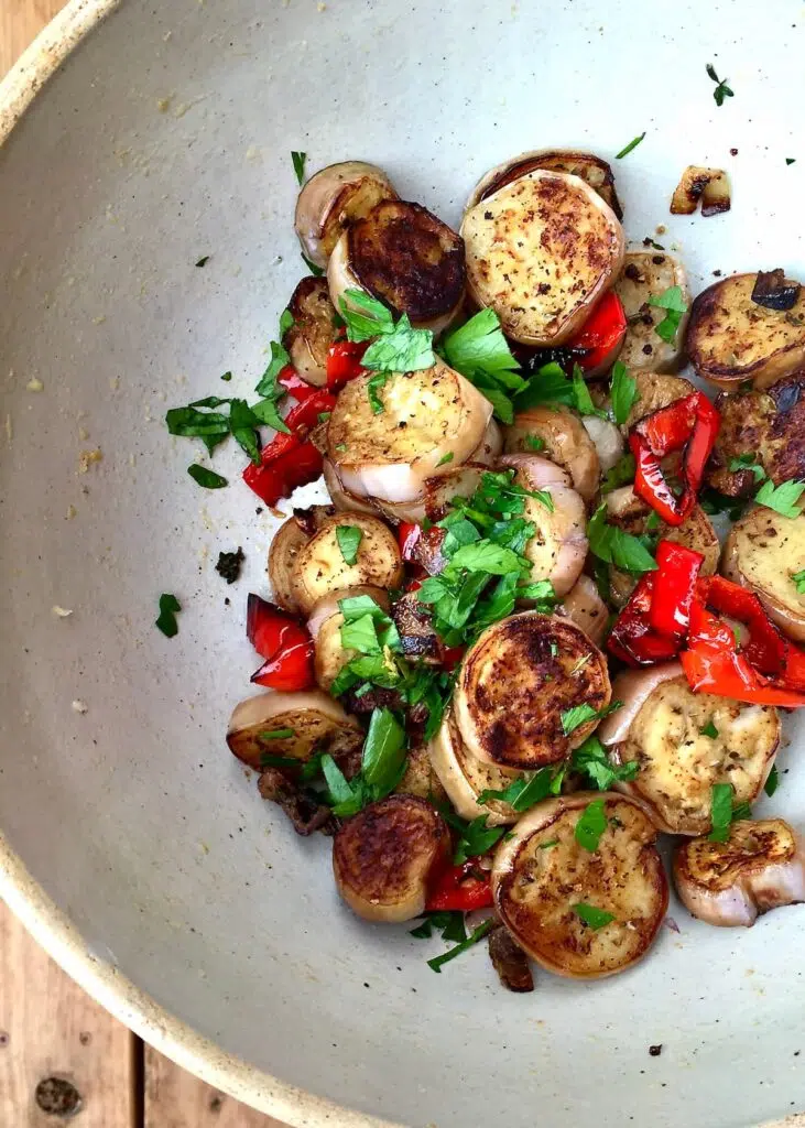 a bowl of cooked baby eggplant.