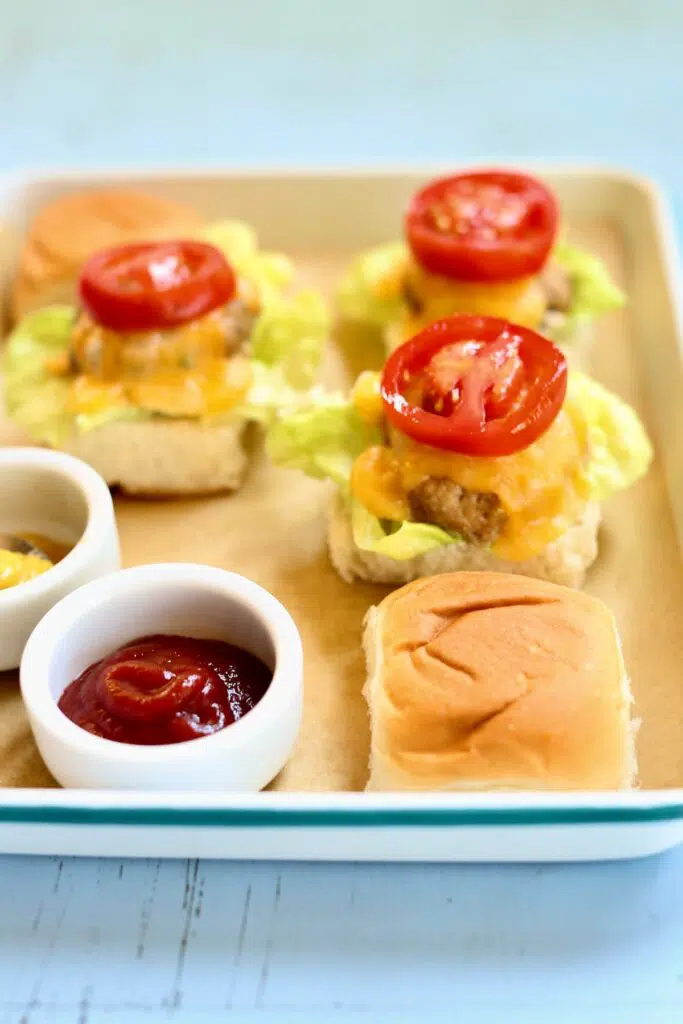 a tray of turkey burger sliders on a platter.
