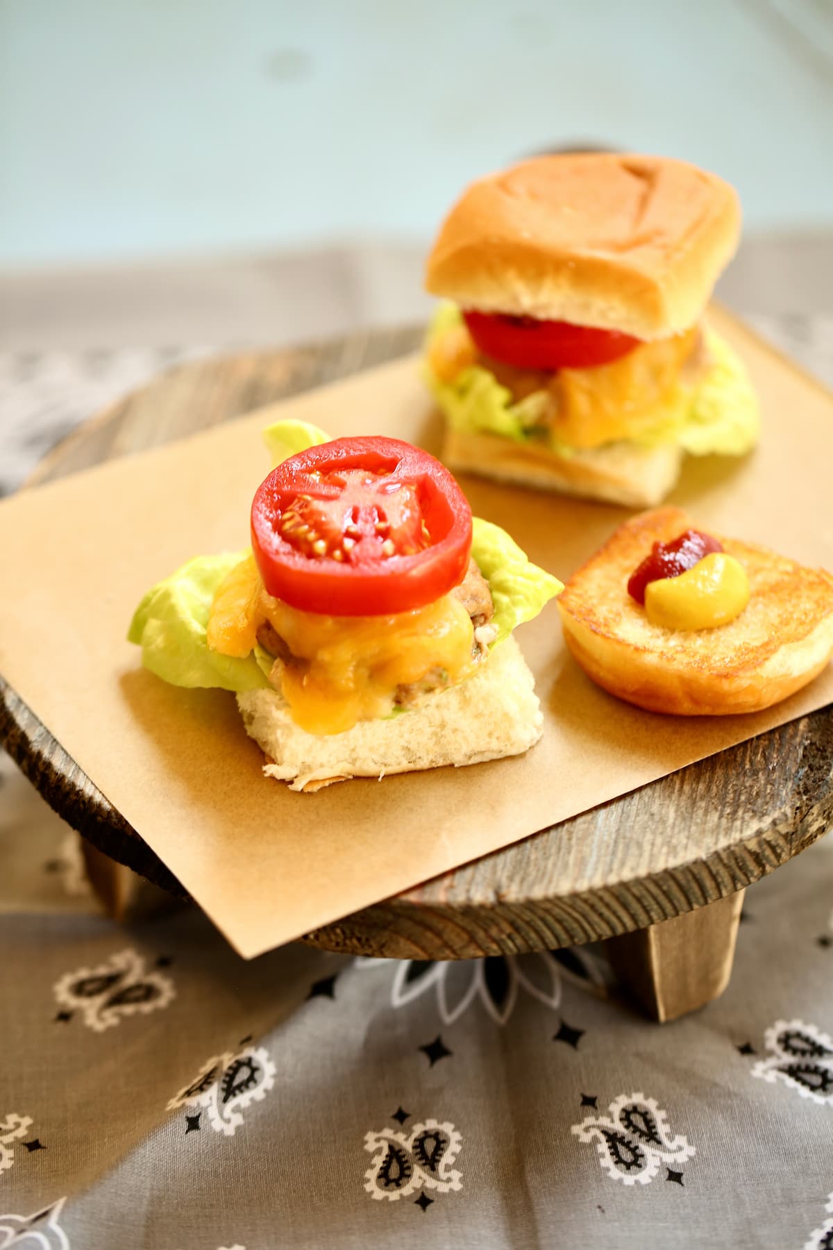a photo of a turkey burger slider on a serving tray.
