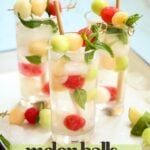 a tray of drinks with melon balls in them with a text overlay.