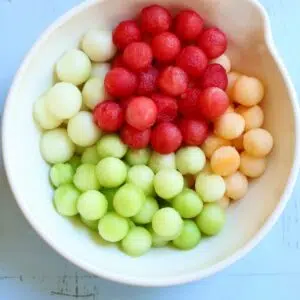 a bowl of melon balls.