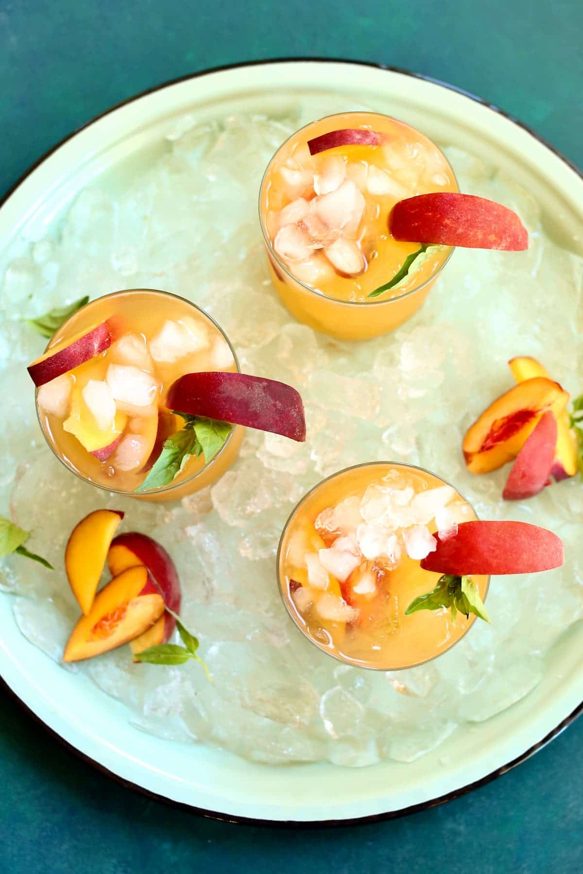 an icy tray of peach beverages.