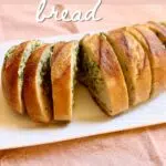 a lad of bread on a orange table with text overlay.