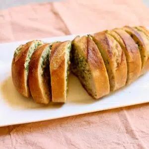 a loaf of cooked garlic bread.